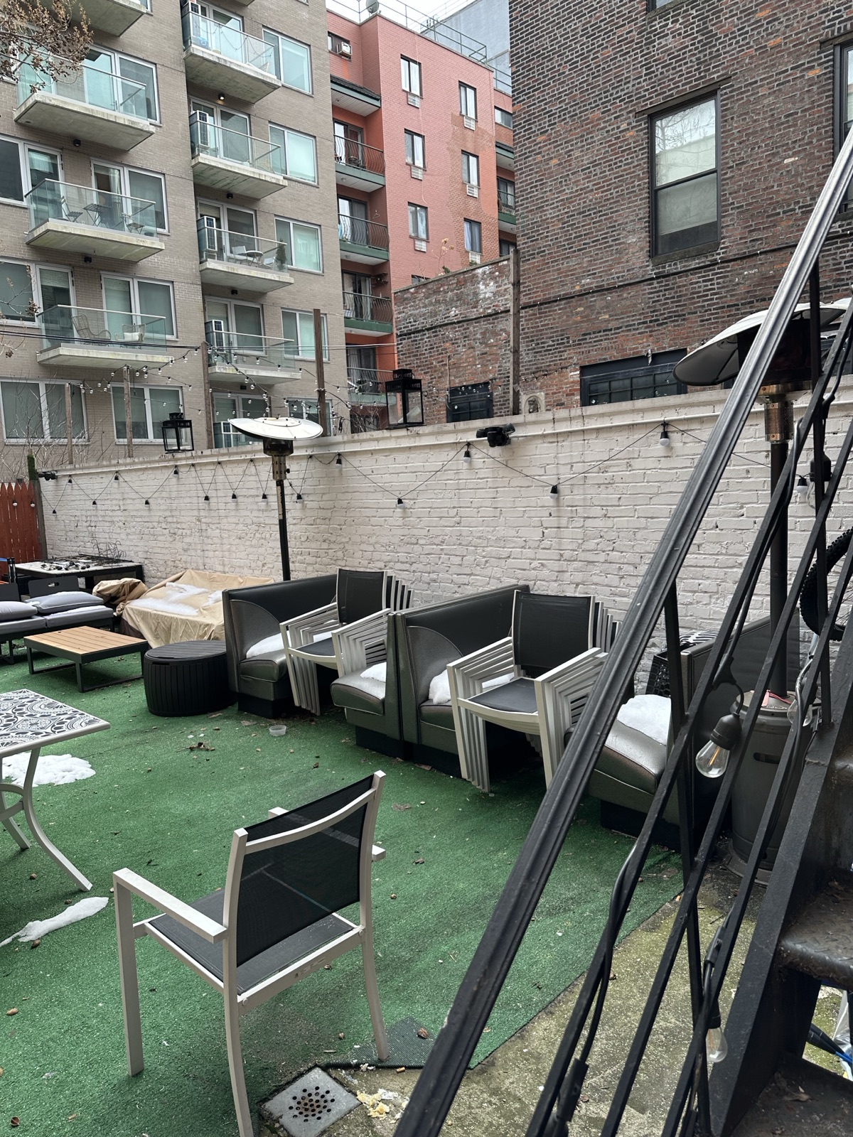 Rear yard behind 84 Clinton in Manhattan showing outdoor seating potential.